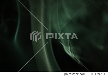 Green smoke on a dark background, colourful abstract green fog, minimalistic background,  108179711