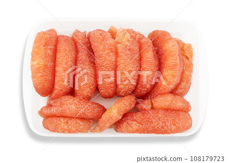 Fresh pealed pomelo fruit on white plastic tray with clipping path, top view Fresh pealed pomelo fruit on white plastic tray with clipping path, top view 108179723