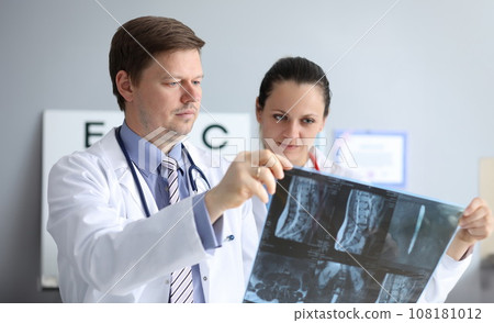 Doc colleague discussing x-ray Doc colleague discussing x-ray 108181012