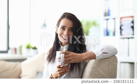 Happy inspired woman drinking coffee 108181111