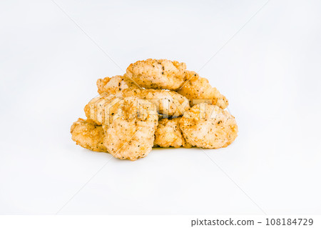 Breaded Chicken Inner Fillet on a White Background,Chicken Breaded Raw Meat.Chicken Breaded Fillet. Breaded chicken nuggets. Fast homemade food at home. Chicken breaded schnitzels. Fast cooking. Breaded Chicken Inner Fillet on a White Background,Chicken Breaded Raw Meat.Chicken Breaded Fillet. Breaded chicken nuggets. Fast homemade food at home. Chicken breaded schnitzels. Fast cooking. 108184729
