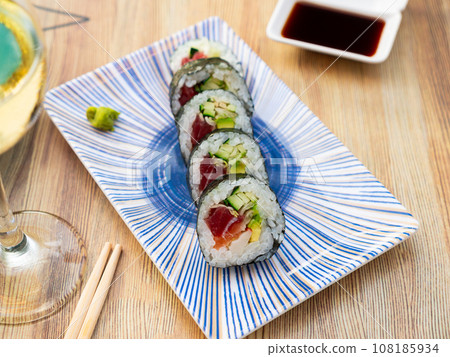 Japanese roll futomaki with soy sauces Japanese roll futomaki with soy sauces 108185934