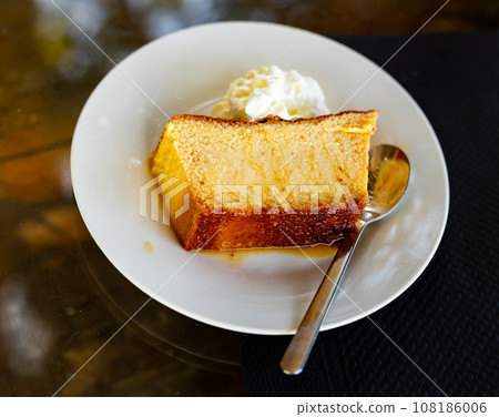 delectable pudding served elegantly delectable pudding served elegantly 108186006