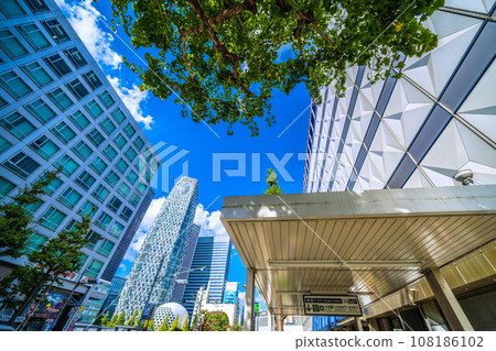Tokyo cityscape in Japan October. View of Shinjuku subcenter, Cocoon Tower, etc. in front of Shinjuku Station = 24th 108186102