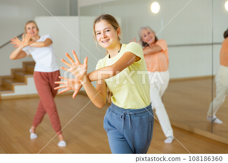 Teenager girl dancing in dance center 108186360