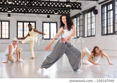 Asian woman studying movement of contemporary dance Asian woman studying movement of contemporary dance 108187046