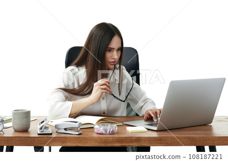 beautiful businesswoman using laptop computer for online work at table 108187221