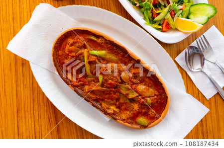 Izmir kofte, turkish dish of spicy meatballs Izmir kofte, turkish dish of spicy meatballs 108187434