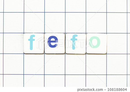 Colorful tile letter in word FEFO (Abbreviation of first expired first out) on white grid background Colorful tile letter in word FEFO (Abbreviation of first expired first out) on white grid background 108188604