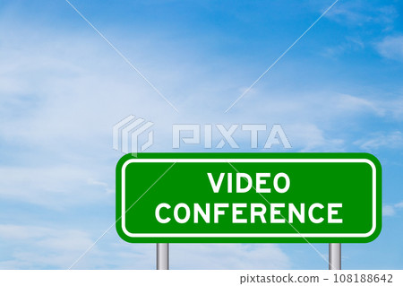 Green color transportation sign with word video conference on blue sky with white cloud background 108188642