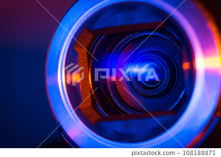 Video camera lens lit by blue and red neon light Video camera lens lit by blue and red neon light 108188871