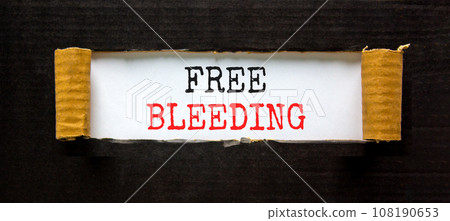 Free bleeding symbol. Concept words Free bleeding on beautiful white paper. Beautiful black table black background. Gen Z, motivational, freedom free bleeding concept. Copy space. Free bleeding symbol. Concept words Free bleeding on beautiful white paper. Beautiful black table black background. Gen Z, motivational, freedom free bleeding concept. Copy space. 108190653