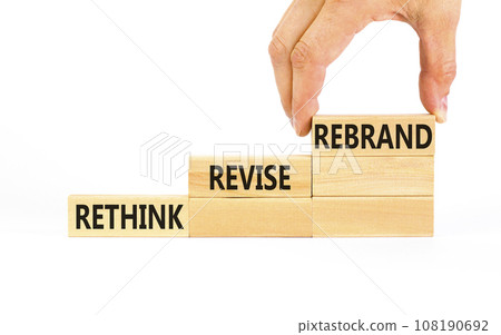 Rethink revise rebrand symbol. Concept word Rethink Revise Rebrand on beautiful block. Beautiful white table white background. Business brand motivational rethink revise rebrand concept. Copy space. Rethink revise rebrand symbol. Concept word Rethink Revise Rebrand on beautiful block. Beautiful white table white background. Business brand motivational rethink revise rebrand concept. Copy space. 108190692