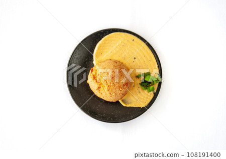 Bow de queujo cheese bun with truffle paste and cheddar cheese Bow de queujo cheese bun with truffle paste and cheddar cheese 108191400