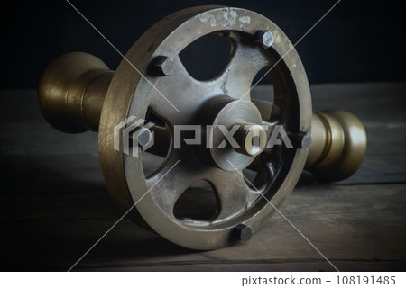 Antique Wheel on Wood Antique Wheel on Wood 108191485