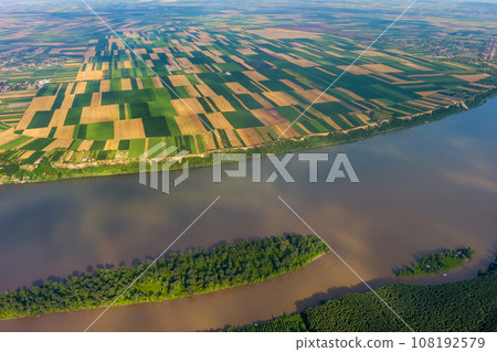 Aerial view of fields on bank of Danube 108192579
