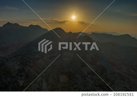 Spectacular sunset on mountain valley 108192581
