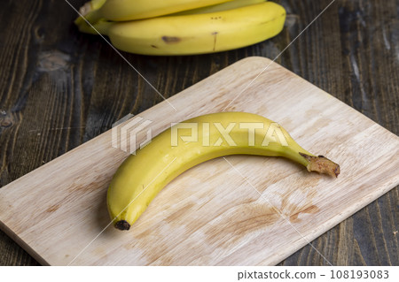 Ripe yellow bananas on the table 108193083