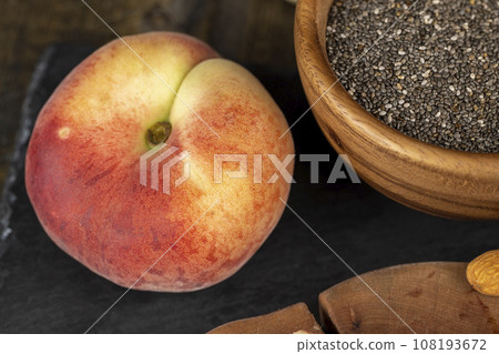 ripe delicious peaches on the table, making desserts 108193672