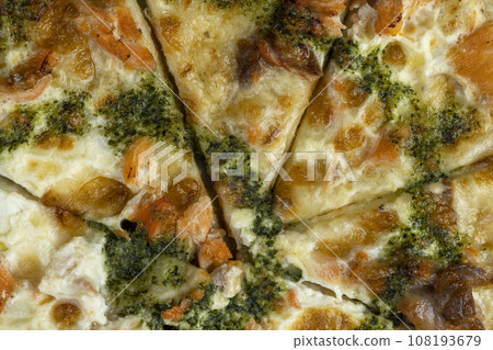 pizza with red trout fish and green sauce food and seafood 108193679