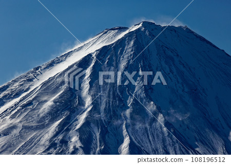 Mt. Fuji rising in snow as seen from Mt. Settugatake in the Misaka Mountains Mt. Fuji rising in snow as seen from Mt. Settugatake in the Misaka Mountains 108196512
