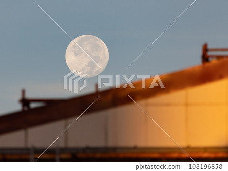 full moon on an autumn day full moon on an autumn day 108196858
