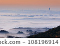 Great Buddha towering beyond the fog 108196914