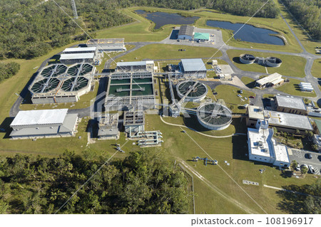 Aerial view of water treatment factory at city wastewater cleaning facility. Purification process of removing undesirable chemicals, suspended solids and gases from contaminated liquid 108196917