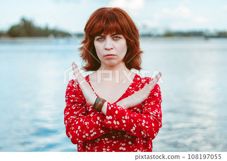 girl crossing her arms, denial pose 108197055