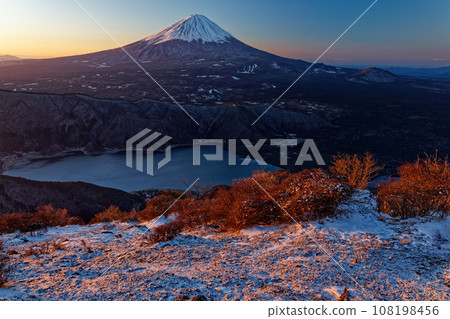 Mt. Fuji and Saiko in the sunrise seen from Misaka Mountains and Mt. Mt. Fuji and Saiko in the sunrise seen from Misaka Mountains and Mt. 108198456
