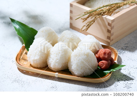 Salted rice balls in a colander 108200740
