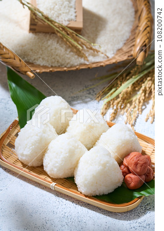 Salted rice balls in a colander 108200742