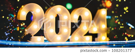 New Year 2024 - Celebration - Abstract Defocused Lights. Beautiful Panoramic web banner New Year 2024 - Celebration - Abstract Defocused Lights. Beautiful Panoramic web banner 108201377