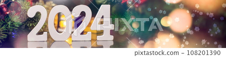 New Year's Eve 2024 Celebration Background.Christmas lights bokeh background. Holiday postcard. Happy New Year 2024 108201390