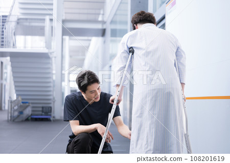 Physical therapist doing rehabilitation 108201619