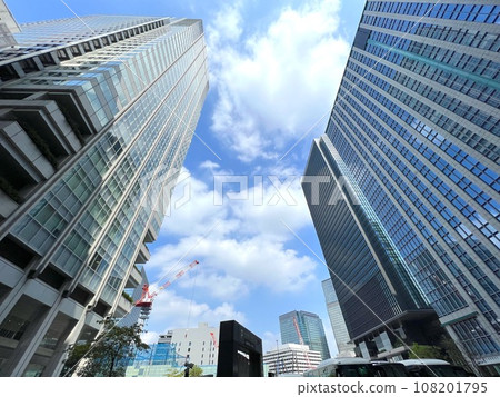Landscape of the office town looking up at a skyscraper Landscape of the office town looking up at a skyscraper 108201795