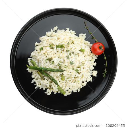 Delicious risotto with asparagus isolated on white, top view Delicious risotto with asparagus isolated on white, top view 108204455