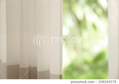 Window with elegant curtains indoors, closeup view 108204579