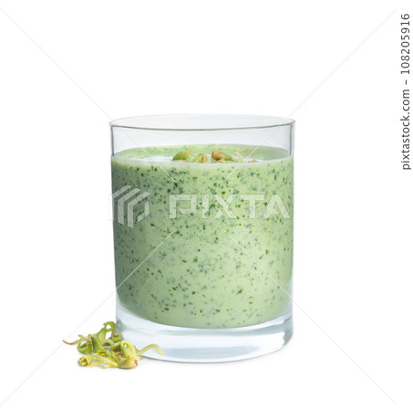 Glass with green buckwheat smoothie isolated on white 108205916