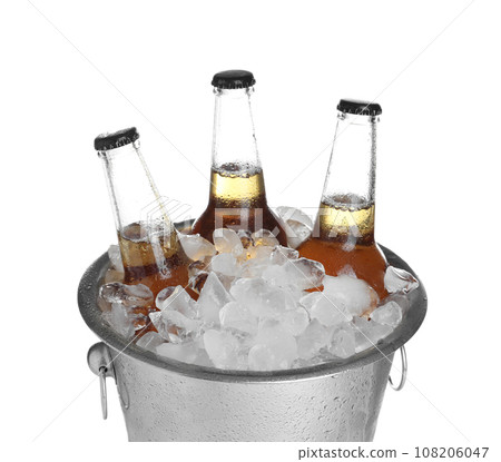 Beer in metal bucket with ice isolated on white Beer in metal bucket with ice isolated on white 108206047