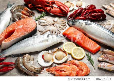 Fresh fish and seafood on marble table Fresh fish and seafood on marble table 108206225