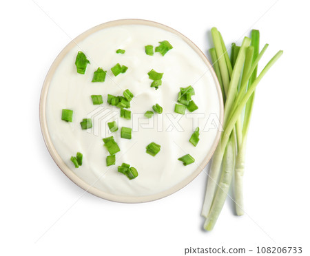 Fresh sour cream with onion on white background, top view Fresh sour cream with onion on white background, top view 108206733