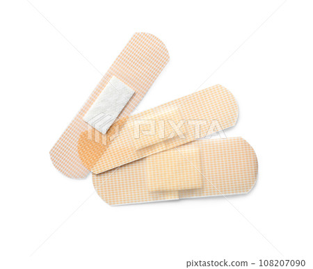 Medical sticking plasters isolated on white. First aid item Medical sticking plasters isolated on white. First aid item 108207090