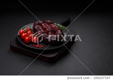 Delicious black blood sausage or black pudding with spices and herbs Delicious black blood sausage or black pudding with spices and herbs 108207397