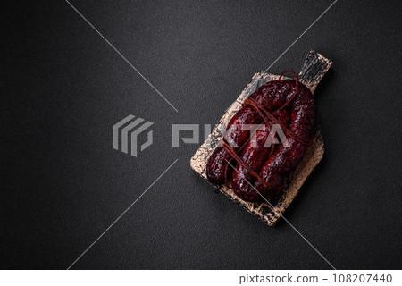 Delicious black blood sausage or black pudding with spices and herbs 108207440