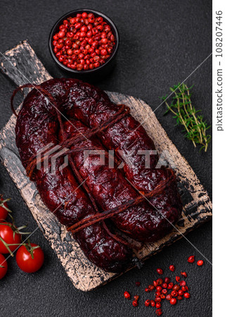 Delicious black blood sausage or black pudding with spices and herbs Delicious black blood sausage or black pudding with spices and herbs 108207446