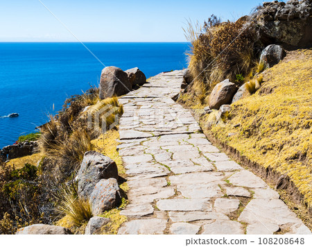 Impressive stone path on island Taquile, Lake Titicaca, Puno region, Peru Impressive stone path on island Taquile, Lake Titicaca, Puno region, Peru 108208648