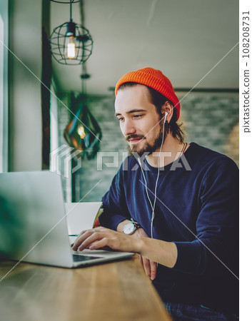 skilled freelancer enjoying remote job typing publication for web blog on laptop skilled freelancer enjoying remote job typing publication for web blog on laptop 108208731
