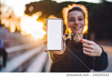 Selective focus on smartphone display with copy space area for text delivery advertising Selective focus on smartphone display with copy space area for text delivery advertising 108209162