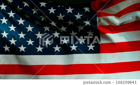 Close up of Waving American Flag on Black Background, Super Slow Motion, Filmed on High Speed Cinematic Camera at 1000 FPS Close up of Waving American Flag on Black Background, Super Slow Motion, Filmed on High Speed Cinematic Camera at 1000 FPS 108209641